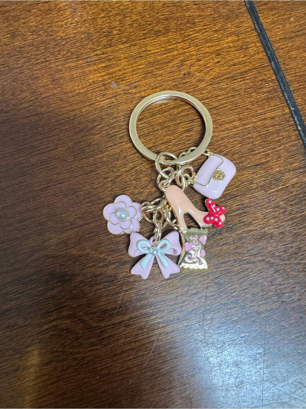 gold-toned multi-charm keychain